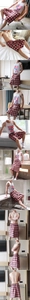 Detail of men's red plaid lounge shorts featuring elastic waistband in hotel room setting