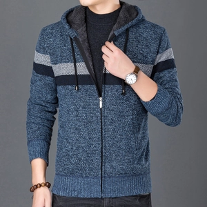Detail of men's blue knit cardigan with thick fleece lining and striped pattern