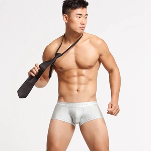 Detailed close-up of men's nylon boxer briefs showing the smooth fabric and elastic waistband