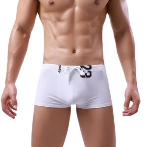 Men's white quick-dry swim trunks with drawstring and black number 23 print detail