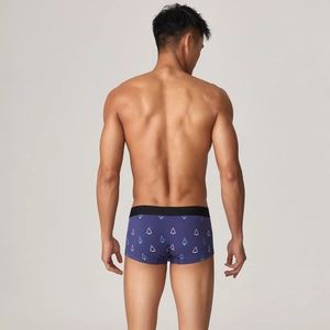 Rear view of men's low-waist boxer briefs with blue tree print and wide black waistband