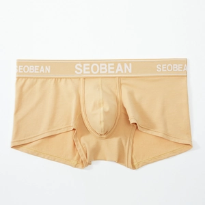 Close-up of men's breathable cotton boxer briefs with elastic waistband and U-convex pouch