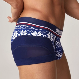 Detail view of men's blue low-rise boxers with jacquard texture and breathable side mesh
