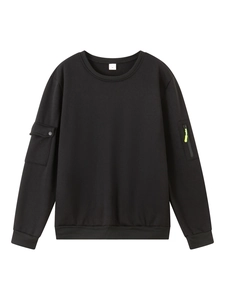 Detailed view of black sweatshirt sleeve with utility pockets and neon green zipper accents