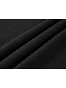 Close-up of premium black knit fabric texture showing the weave on the sports hoodie set