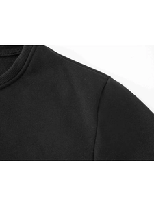 Detailed close-up of the ribbed crew neck and soft fleece lining of the black sports hoodie
