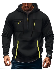 Detail of men's black hoodie with neon yellow zipper cords and multiple tactical pockets