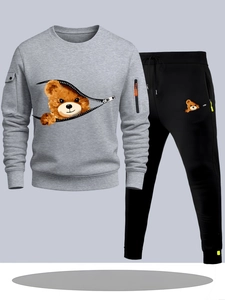 Detail of grey men's sweatshirt with 3D teddy bear print and orange contrast zipper
