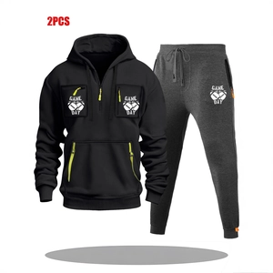 Men's 2-piece sport set with black half-zip hoodie and dark grey joggers featuring neon accents