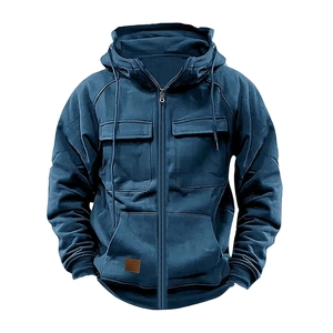 Detail view of navy hoodie featuring a full zipper, cargo chest pockets, and leather patch