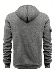 Rear view of dark grey hoodie showing cargo arm pockets and ribbed cuffs texture