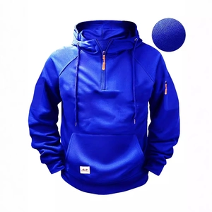 Bright blue men's hoodie with half-zip collar and multiple pockets in athletic style
