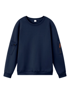 Detail view of navy blue sweatshirt featuring an orange zipper pocket and sleeve utility pouch