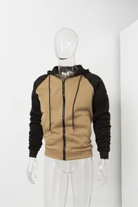 Detail of color block hoodie featuring khaki body with black raglan sleeves and full zip