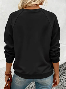 Vue de dos d'un sweat-shirt noir classique à manches longues avec bords-côtes