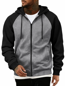 Close-up of contrast raglan sleeves and adjustable drawstring hood on men's hoodie
