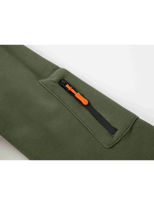 Close-up of army green sweatshirt sleeve featuring a black zipper pocket and orange puller