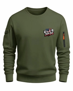 Detail of army green sweatshirt featuring a zip pocket with orange tab and USA 2026 print