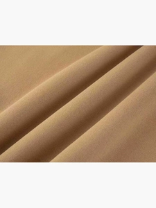 Vista macro del tessuto a maglia kaki con trama fine e materiale morbido della felpa