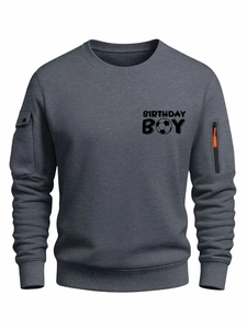 Men's dark gray crew neck sweatshirt with Birthday Boy soccer print and utility sleeve pockets