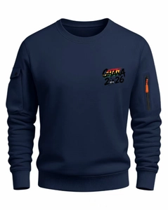 Detailed view of the functional arm pockets and the GHANA 2026 logo on the navy sweatshirt