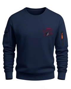 Detail of cargo sleeve pockets and red Qatar 2026 print on navy sweatshirt