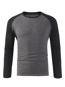 Detail of raglan sleeve stitching and grey-black contrast fabric on long sleeve tee