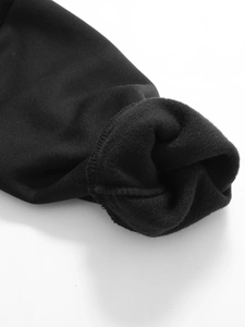 Detail view of the heavy black fleece lining on hoodie cuffs for warmth and comfort