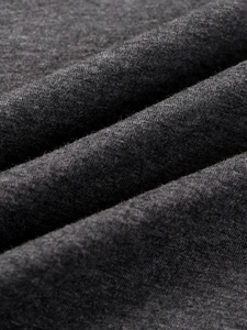 Macro shot of dark grey knit fabric texture for breathable long sleeve men t-shirt