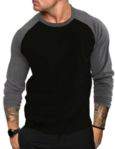 Detail of raglan sleeve stitching on men's black and grey breathable long sleeve t-shirt