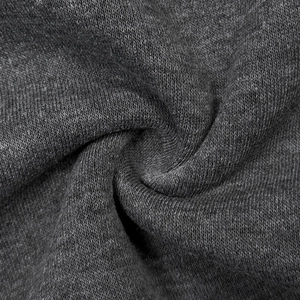 Macro shot of dark grey heavy knit fabric texture with soft and elastic hoodie material