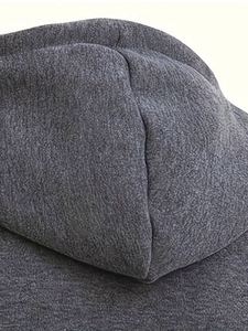 Detailed close-up of dark grey hoodie fabric showing fine texture and neat stitching