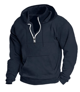 Detail of dark blue hoodie showing white half-zip, drawstrings and front kangaroo pocket