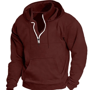 Men's casual burgundy oversized hoodie with half-zip closure and front kangaroo pocket