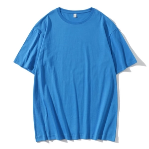 Detailed close-up of a royal blue crew neck cotton t-shirt with a loose fit design