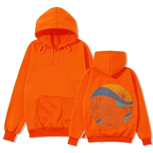 Orange oversized hoodie with Here Comes The Sun back print and front kangaroo pocket