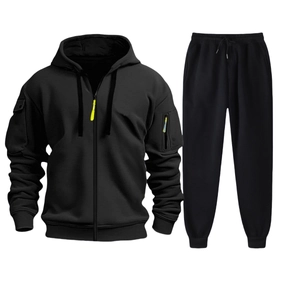Detail of black sports tracksuit featuring tactical sleeve pockets with neon yellow zippers