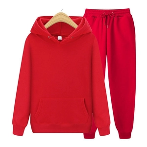 Close-up of red fleece tracksuit with drawstring hoodie and elastic waist joggers