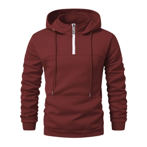Men's burgundy half-zip hoodie with kangaroo pocket and adjustable drawstring hood