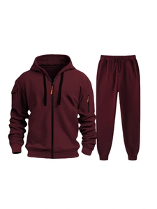 Burgundy men's tracksuit set featuring hooded zip-up sweatshirt and slim joggers