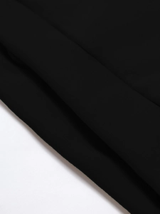 Close-up of the smooth black fabric texture and high-quality drape of this men's hoodie