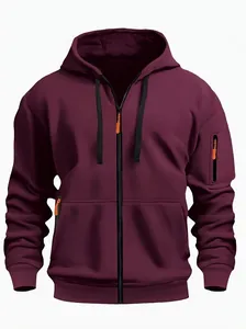 Detail of burgundy hoodie showing black drawstring, orange zipper, and utility sleeve pocket