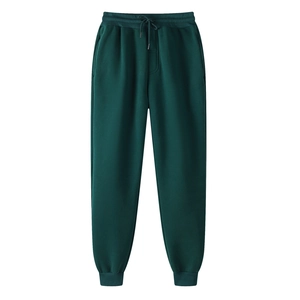 Men's dark green fleece joggers with elastic drawstring waist and ribbed cuffs