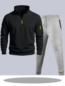 Détail du survêtement homme avec fermetures éclair fluo sur le sweat à capuche et jogging