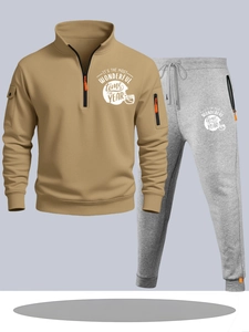 Detail of khaki half-zip hoodie and grey sweatpants featuring functional pocket and orange zipper
