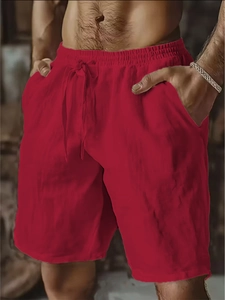 Detail of red drawstring waist and elastic waistband on men's linen casual shorts