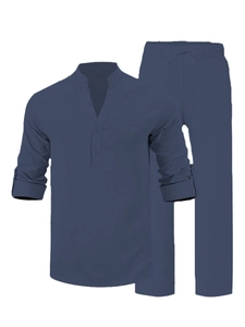 Detail of grey-blue linen suit showing the textured fabric and drawstring waistband