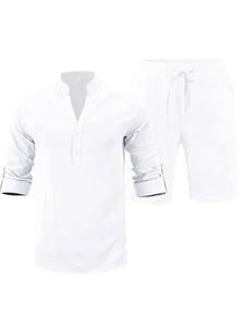 Detail view of white linen summer set featuring roll-tab long sleeve shirt and drawstring shorts