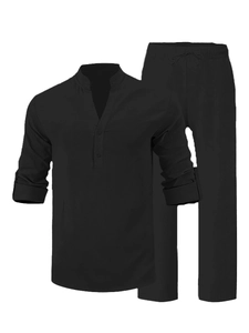 Detailed view of black linen leisure set with button-down shirt and drawstring trousers