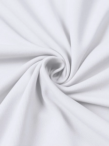 Detailed macro view of white knitted hoodie fabric texture showing soft cotton blend material